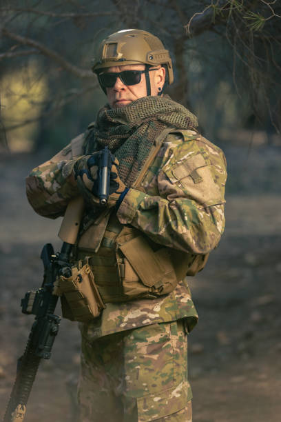 istock airsoft soldier in the forest at sunset 2152610255