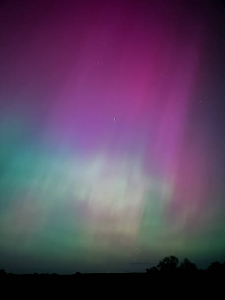 istock Northern lights or Aurora borealis in the sky 2152610677