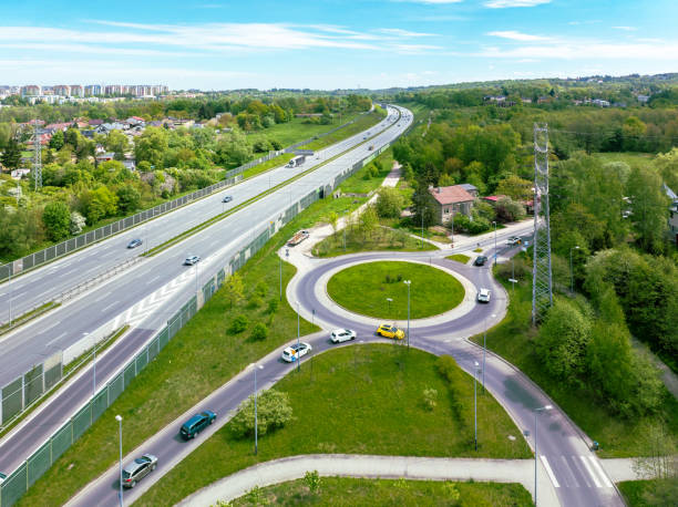 istock Three lane highway and traffic circle in Krakow, Poland 2152615594