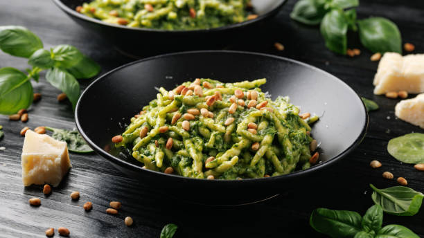 istock Trofie pasta with creamy spinach sauce and toasted pine nuts 2152621798