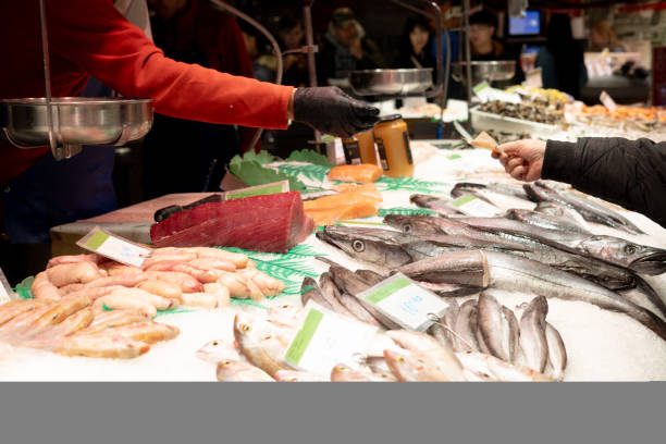 istock Man buying fresh fish on the market 2152625762
