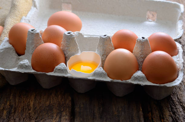 Fresh chicken eggs on the table. Animal products.