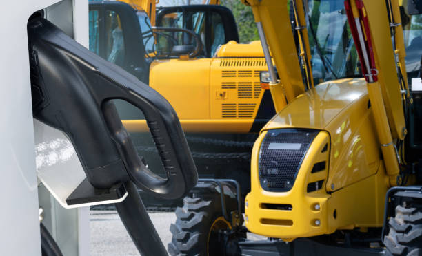 istock Electric construction machines with charging station 2152629141