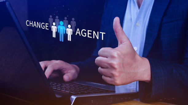 istock Change Agents concept, Leadership changes to develop the organization for success, Businessman holding a human icon with word Change Agent. 2152633968