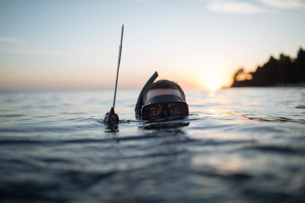 istock Spearfisherman submerged up to his mask. 2152635862