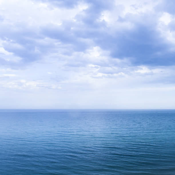 istock Calm windless ocean in blue tones. 2152636167