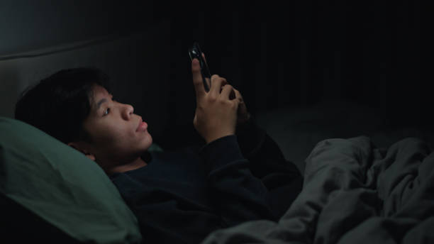 istock Teenager using smartphone at night. 2152639318