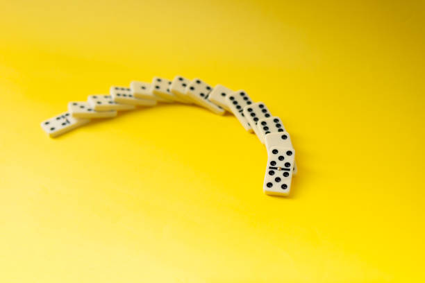 istock Dominoes with yellow background, copy space and various angles 2152639970