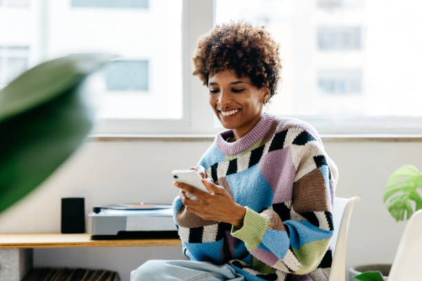 istock Female working in a modern co-working office space 2152644395