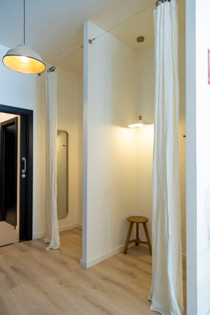istock Modern dressing area with draped curtains and ambient lighting. 2152646562