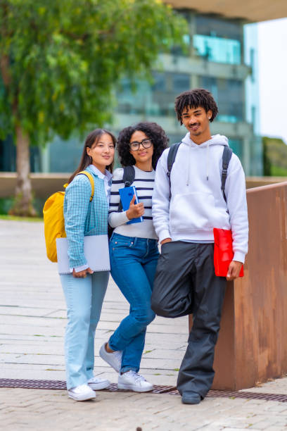 istock Portrait of multiracial university exchange students standing in the campus 2152647033