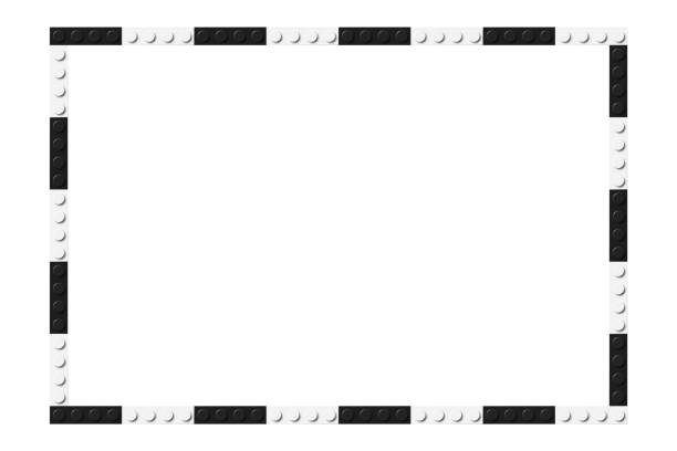 istock Simple frame composed of black and white toy blocks. Black and white brick banner. Abstract vector background 2152648653