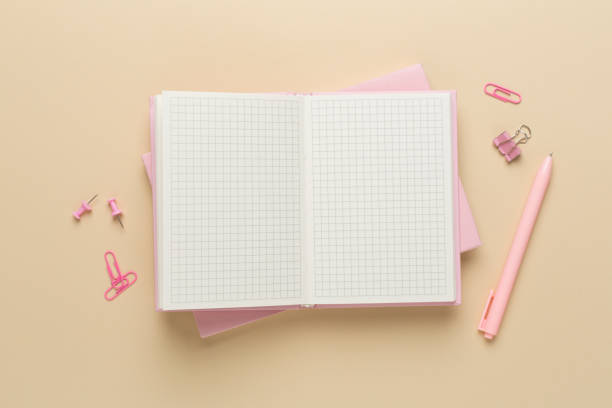istock Notebook with stationery on color background, top view 2152651987
