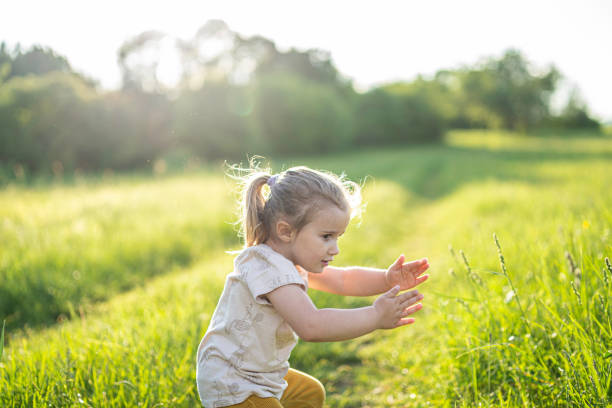 istock Fun Outdoors. Happy Girl in Nature at Sunset, copy space. 2152657920