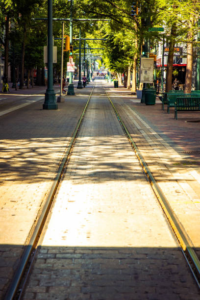 Memphis, TN, USA - 04-22-2024: Tram rails on Memphis Main street at day in summer