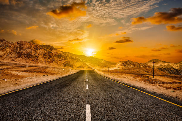 istock Road in Himalayas with mountains 2152666278