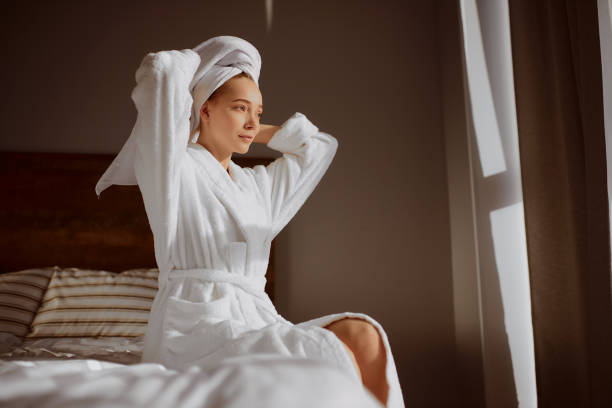 istock Attractive Young Woman Wrapped with Bath Towel 2152668989