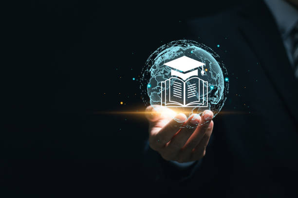 istock Online education concept. Businessman holding virtual E-learning icon. Increase business working skills. Education internet technology. 2152669072