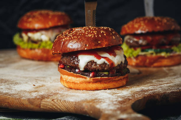 istock Gourmet Burgers Ready for Grilling 2152669166