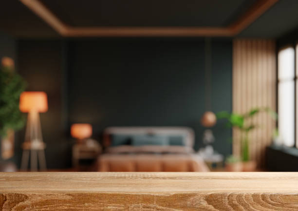 istock Empty wooden table,Orange bed and mockup dark green wall in bedroom interior- 3D rendering 2152670211