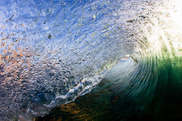 istock Inside the vortex of a curling shorebreak wave on sunrise 2152674529