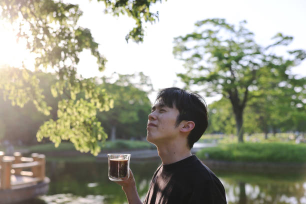 istock Shots focused on the hand holding the coffee 2152674581