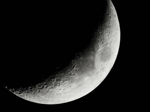 istock Half of a moon and it's craters. 2152675827