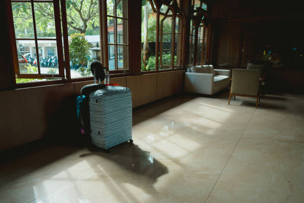 Suitcases in the hotel lobby near the window