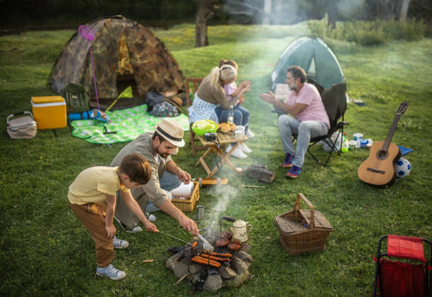 istock A multigenerational family is camping in nature and they make barbeque 2152679862