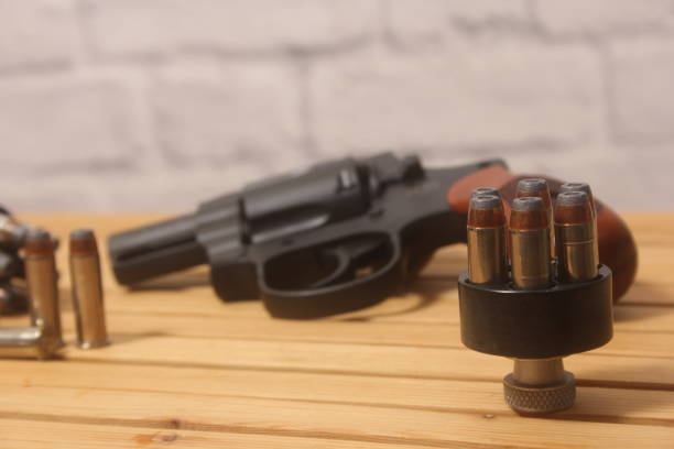 istock Vintage Revolver Gun With Ammunition and Speed Loader 2152682088