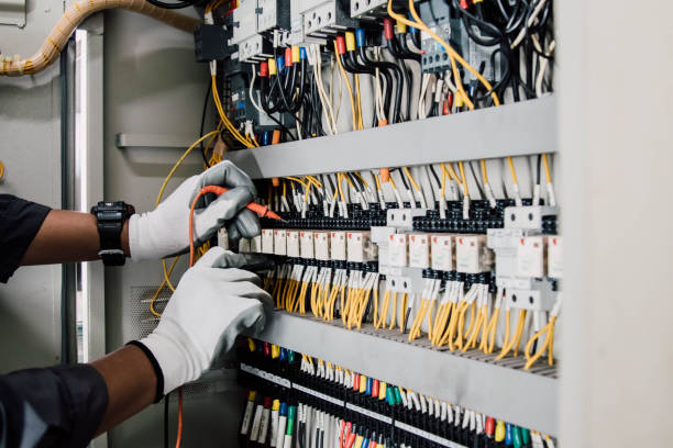 istock Electrician engineer tests electrical installations and wires on relay protection system. 2152682478