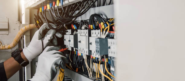 istock Electrician engineer tests electrical installations and wires on relay protection system. 2152682480