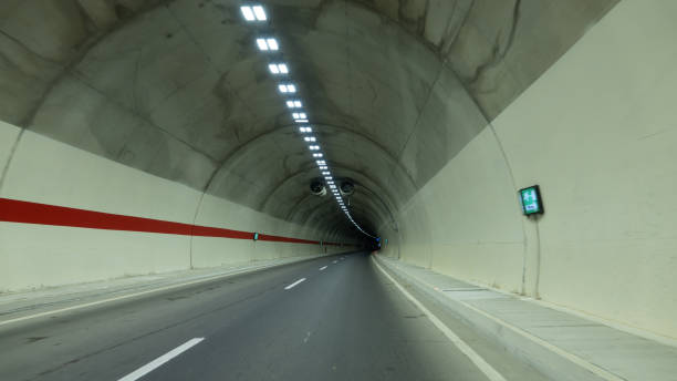 istock Underground tunnel with light and shadow on the surface of the road 2152684042