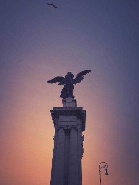 istock Winged Angel statue at Sunrise in Rome 2152684566