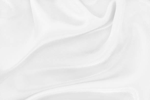 istock White fabric texture for background and design, beautiful pattern of silk or linen. 2152686262