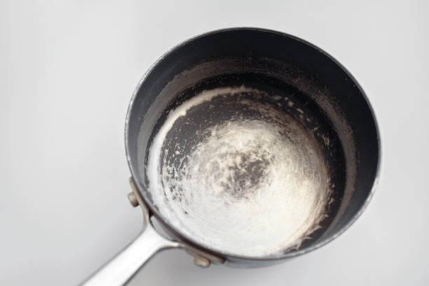 istock Old scratched and non-stick saucepan. 2152686418