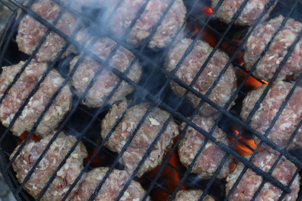 istock Turkish koftes (meatballs) are cooking on the grill. 2152686544