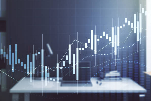 istock Abstract creative financial graph and modern desktop with pc on background, financial and trading concept. Multiexposure 2152687928