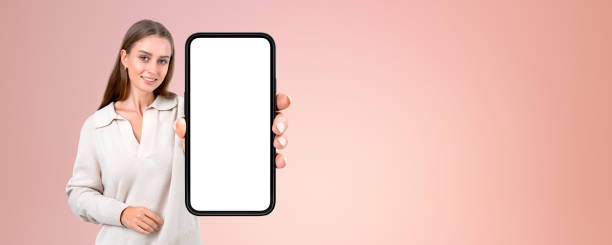 istock Young woman showing phone with blank display 2152689795
