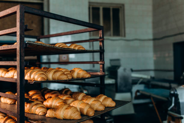 istock freshly baked croissants in the baking oven 2152690803