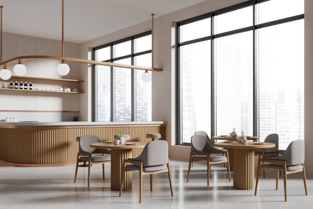 istock Cozy cafe interior with dining tables, bar island near panoramic window 2152691671