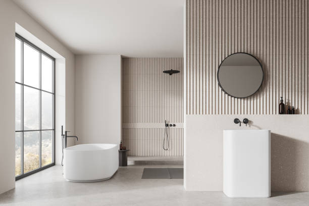 istock Stylish hotel bathroom interior with sink, tub, shower and panoramic window 2152692206
