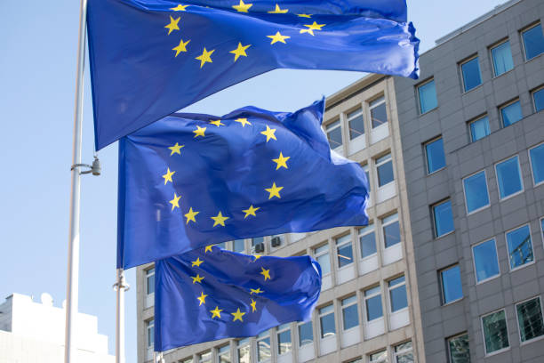 istock EU flags outside a modern office building in Brussels 2152692999