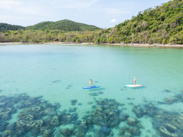 istock Two People Engaging In Watersports in Tropical Paradise 2152693670