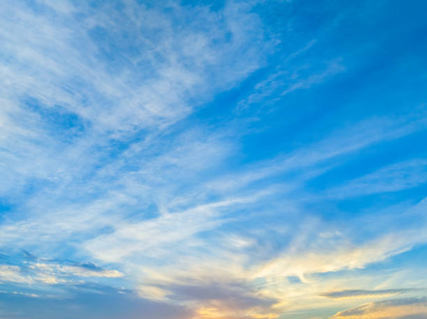 istock Hazy sunrise sky in soft pastel colours with high cloud 2152694277