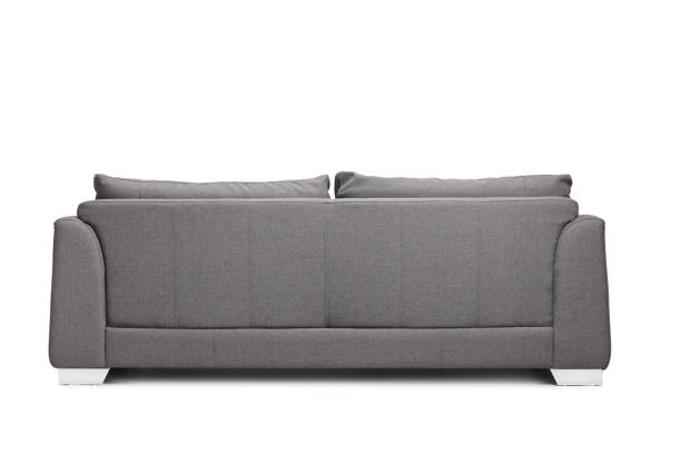 Rear view shot of a grey sofa Rear view shot of a grey sofa isolated on white background couch back stock pictures, royalty-free photos & images