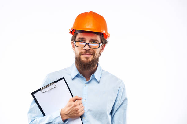 istock Business man in orange helmet shirt construction security professionals 2152696354