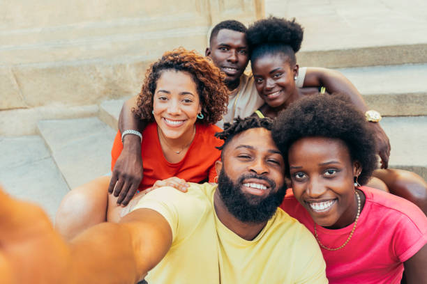 istock Multiracial friends taking selfie shot smiling at camera 2152697273