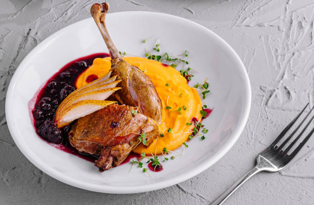 istock Festive holiday dinner with roasted duck 2152698287