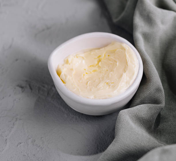 istock Fresh creamy butter in white bowl on linen 2152698686